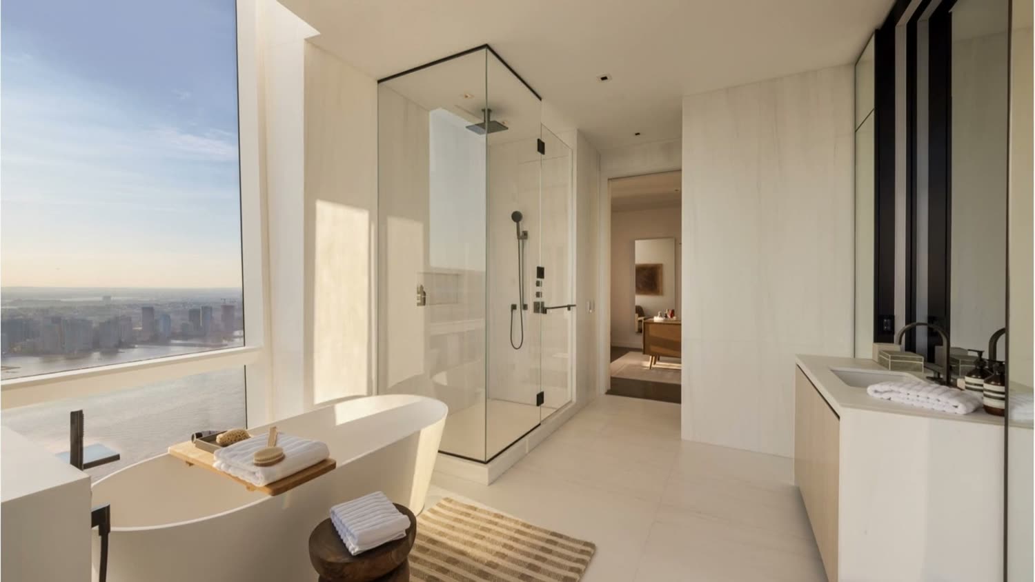 Primary bath with a city view